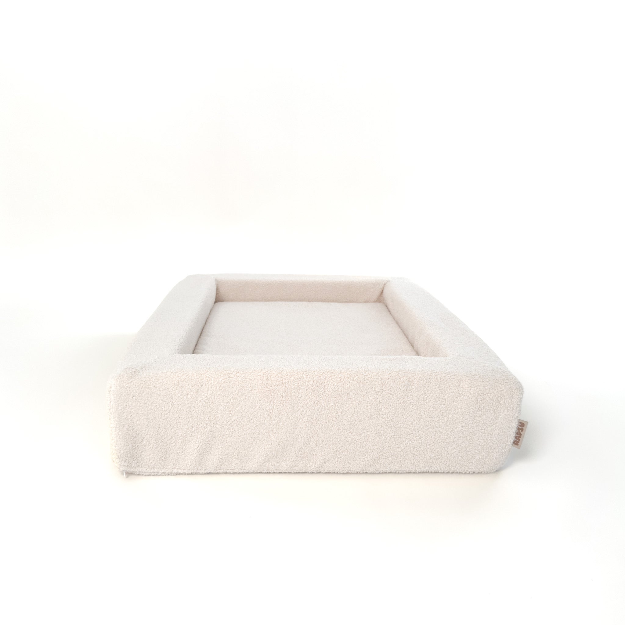 Rapsu Bed L-koko sivulta, sävy luonnonvalkoinen